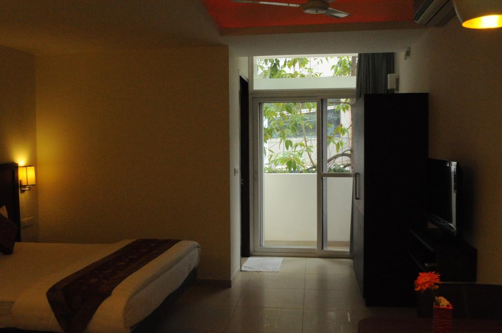 Ixora Suites Μπανγκαλόρ Δωμάτιο φωτογραφία