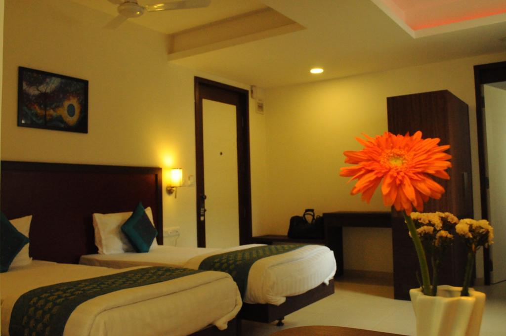 Ixora Suites Μπανγκαλόρ Δωμάτιο φωτογραφία