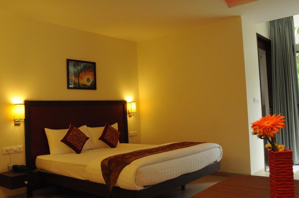Ixora Suites Μπανγκαλόρ Δωμάτιο φωτογραφία